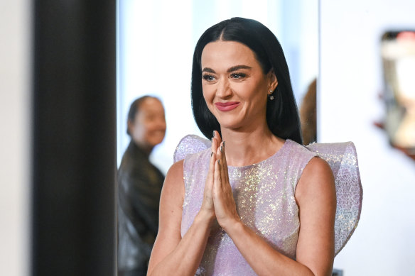 Praying for a positive reception: Katy Perry at the AFL grand final press conference on Thursday.