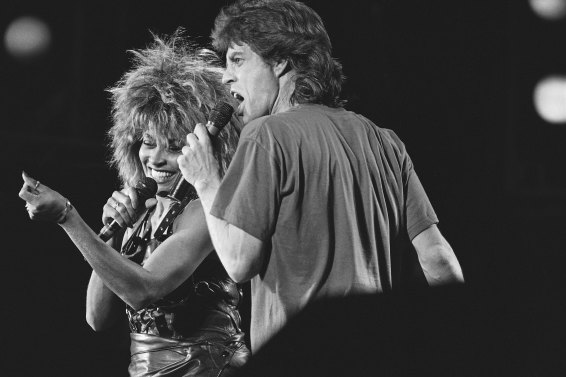 Singer Tina Turner, left, and Mick Jagger perform together during a Live-Aid concert in Philadelphia on July 14, 1985.
