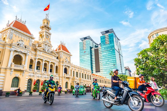 Old and new... Saigon City Hall and the Vincom Centre towers in Ho Chi Minh City.