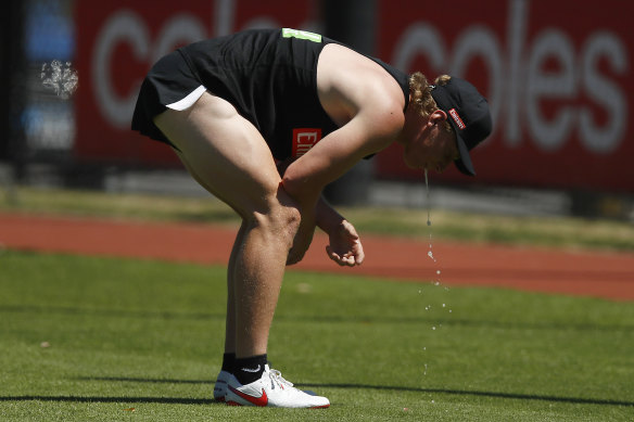 Chugg it up: Isaac Chugg goes into the red at training. 