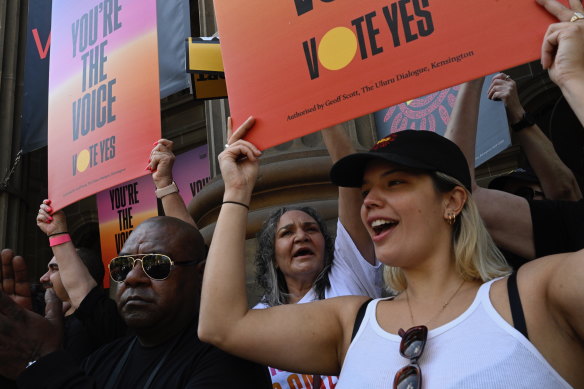 Supporters of an Indigenous Voice to parliament show their support in Melbourne.