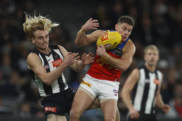 Pies debutant Jakob Ryan had to be substituted with concussion after a heavy clash (shortly after this).