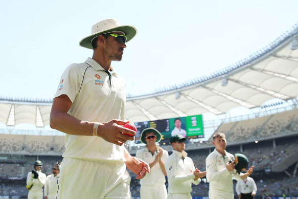 Mitchell Starc walks from the field after taking five wickets during day three of the first Test against New Zealand. 