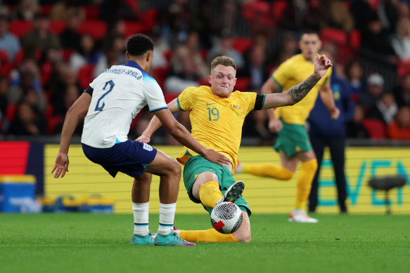 LONDON, ENGLAND - OCTOBER 13: Trent Alexander-Arnold of England battles for possession with Harry Souttar of Australia during the international friendly match between England and Australia at Wembley Stadium on October 13, 2023 in London, England. (Photo by Tom Dulat/Getty Images)