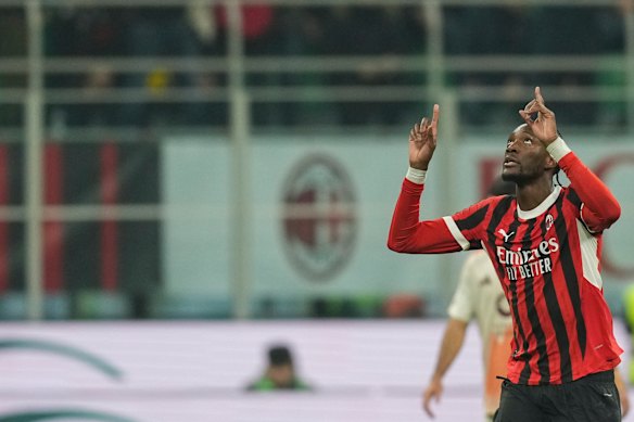 AC Milan’s Tammy Abraham celebrates after scoring the opening goal during an Italian Cup quarterfinal soccer match between AC Milan and Roma at the San Siro stadium, in Milan, Italy.