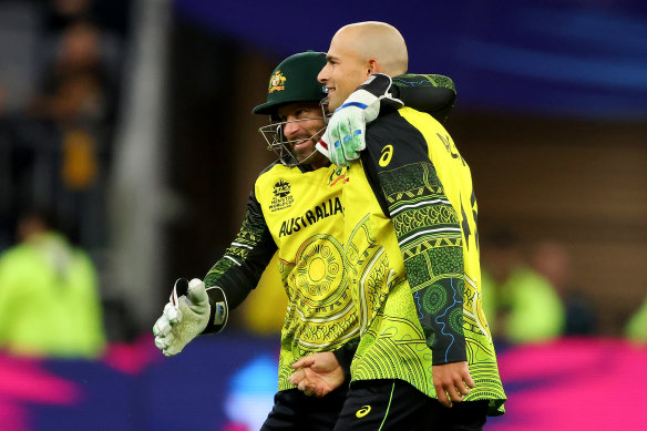 Matthew Wade and Ashton Agar celebrate a wicket for Australia.
