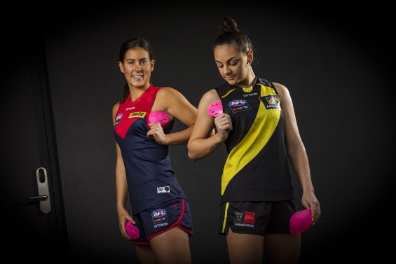 Libby Birch, of Melbourne, and Monique Conti, Richmond, believe breast protection on field makes sense. They are endorsing the product Boob Armour.