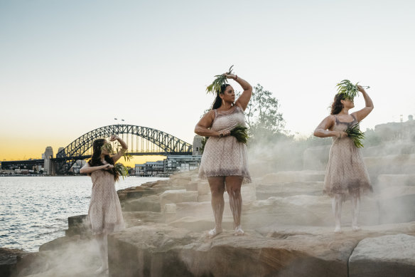 Aboriginal dancers from the Jannawi Dance Clan perform during an Aboriginal cultural tour in Barangaroo.