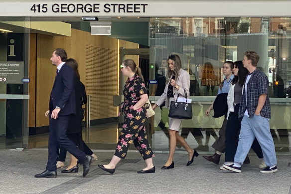 The daughters (right) of Peter Dunne, who died after being struck by a car, leave Brisbane Supreme Court on Monday.