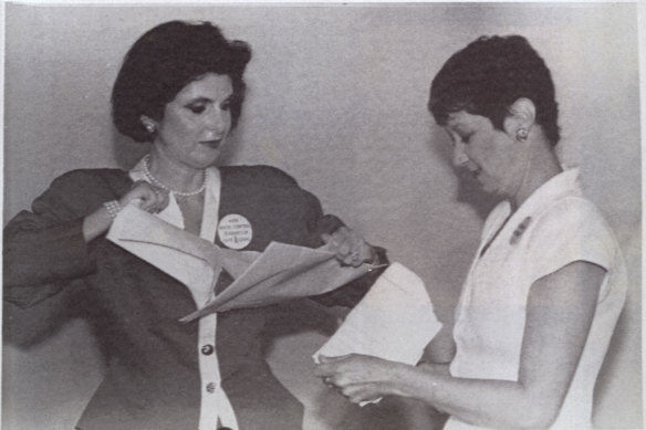 Attorney Gloria Allred (left) and Norma McCorvey, the plaintiff Jane Roe in the US Supreme Court case that legalised abortion, tear up the Justice Department's brief calling for the reversal of Roe v Wade decision.  