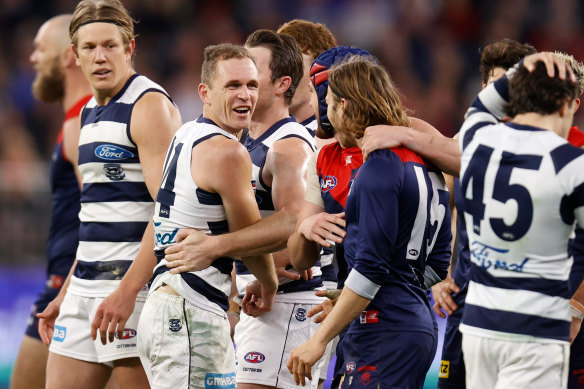 Geelong skipper Joel Selwood trades words with the Demons’ Ed Langdon.