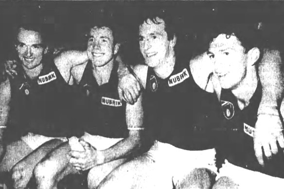 Together for one match only: Anthony, Terry, Neale and Chris Daniher after the game in 1990.