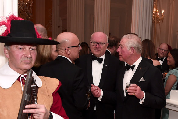 Prince Charles and  George Brandis speak with another guests at the exclusive event. 