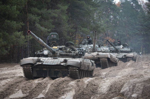 Ukrainian soldiers on captured Russian tanks T-72 hold military training close to the Ukraine-Belarus border near Chernihiv, Ukraine.