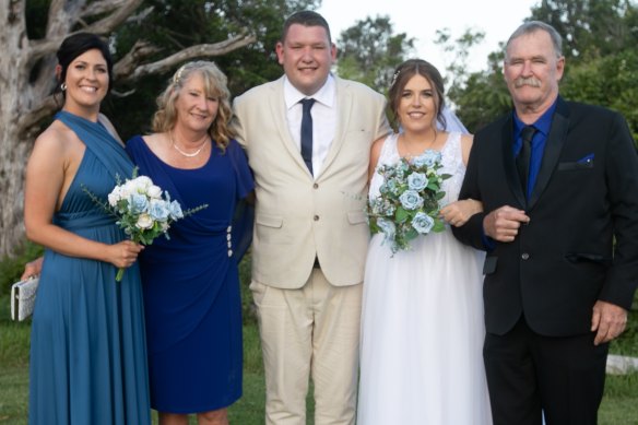 NSW Ambulance paramedic Steven Tougher on his wedding day, with wife Madison, parents Jillian and Jeff, and sister Jess.