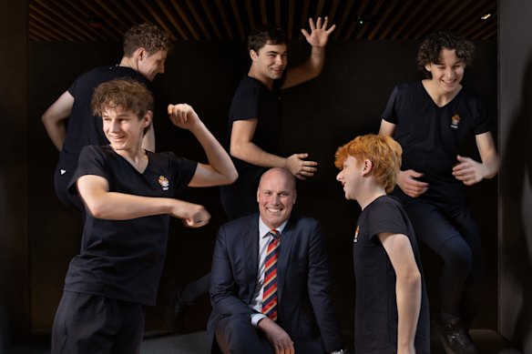 Brighton Grammar School headmaster Ross Featherston with some of the students who have signed up to do dance.