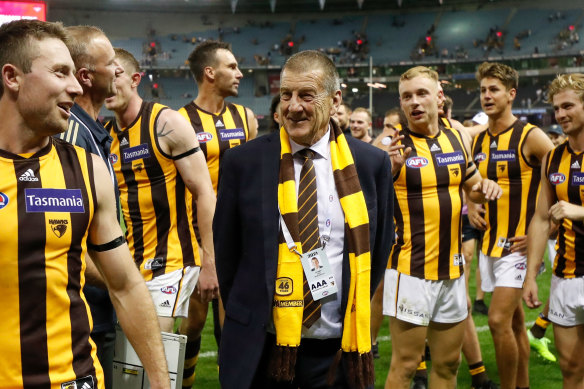 Jeff Kennett with Hawthorn players after their one point win over Essendon earlier in the season.