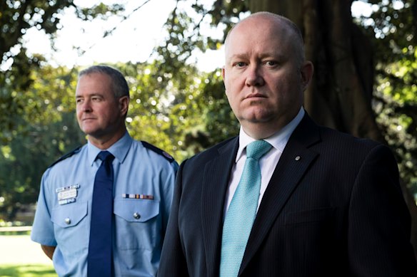 Suiting up: Shane Fitzsimmons (right), now Resilience NSW Commissioner, with his predecessor in the role, Mick Williams. 