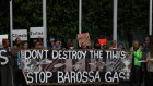 Protesters at the front of the Federal Court during a Santos appeal hearing over the Barossa gas project.