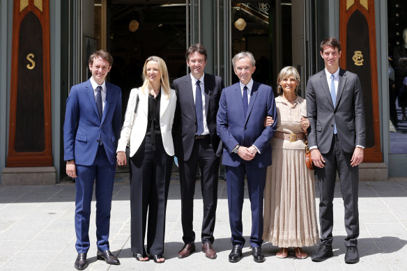 Head of French multinational corporation LVMH Bernard Arnault (centre)   and his wife Helene (second from right),   with their children (from left) Frederic Arnault, Delphine Arnault, Antoine Arnault and Alexandre Arnault.