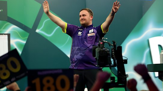 Luke Littler celebrates his quarter-final victory.