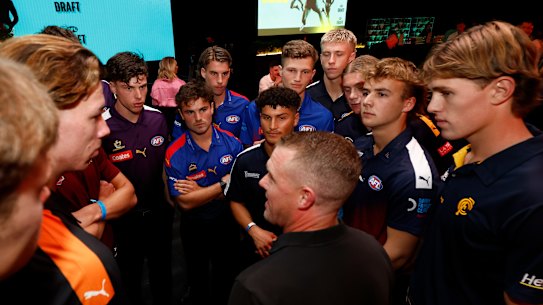 Tarkyn Lockyer, National AFL Academy Manager and coach speaks to the potential draftees before the first round.