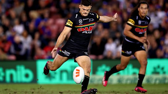 Nathan Cleary kicks a field goal.
