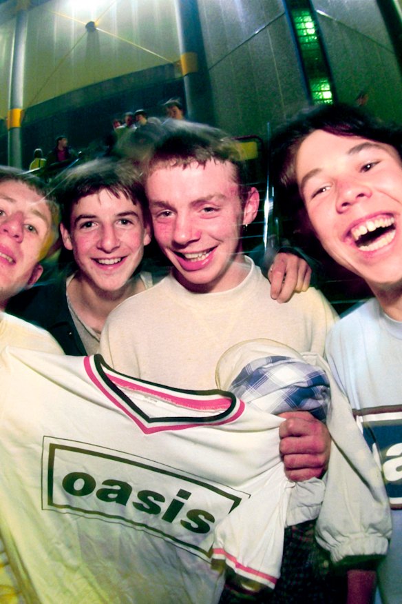 Oasis fans and their merch T-shirts in 1996, when band tees were everywhere.