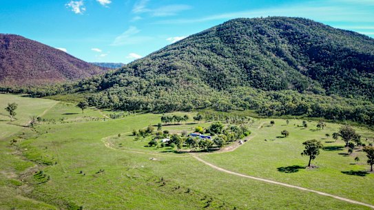The remote property in Thologolong, where Dezi Freeman was shot dead by police. The burnt-out hills from the recent bushfire can be seen on the mountain behind the property.