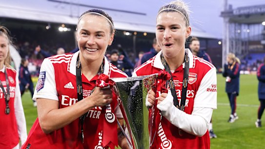 Caitlin Foord (left) and Steph Catley after their League Cup triumph with Arsenal in March.