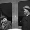 Charles as a boy with his mother the Queen, as the royal train leaves Weymouth in southern England.