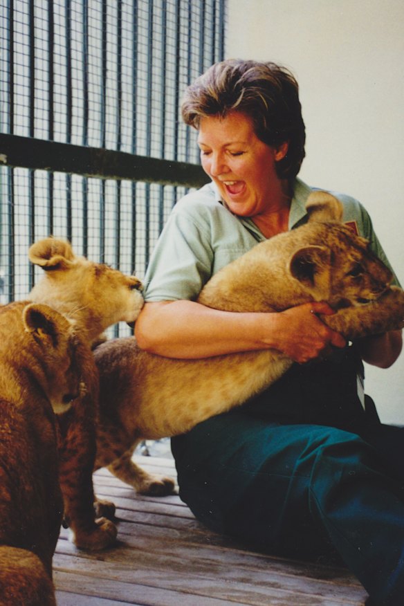 The author with African lion cub triplets Bruiser, Shinyanga and Njeri, in 2000. “Every day was different and exciting, even if the lunchroom was heavy with testosterone,” she says of her time at Taronga Zoo.