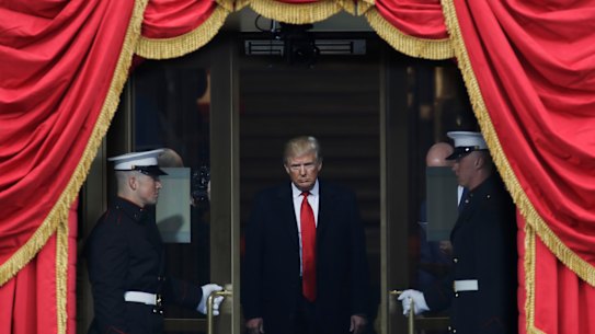 President-elect Donald Trump steps out to the portico to be sworn in as 45th president of the United States, Washington, Friday, Jan. 20, 2017. 