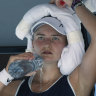 Czech tennis player Barbora Krejcikova cools down during a break in her quarter-final at the 2022 Australian Open.