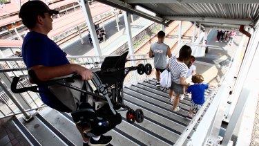 Parents forced to carry prams down the stairs at Redfern station. 