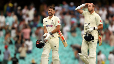 Jimmy Anderson and Stuart Broad make their way off the SCG after England’s gripping draw.