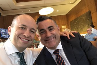 Matt Kean, the NSW Energy and Environment Minister (left) with NSW Nationals leader John Barilaro at the Perth COAG event in November 2019. Kean credits support from Barilaro as critical to getting his energy policy through.