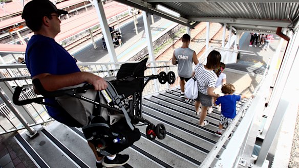 Parents are forced to carry prams down stairs at Redfern station as it has a lift serving just two of its 12 platforms. 
