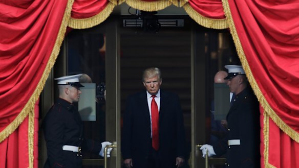 President-elect Donald Trump steps out to the portico to be sworn in as 45th president of the United States on January 20, 2017. 