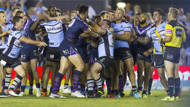 No love lost: Storm and Sharks players at the end of their round 4 clash this year.