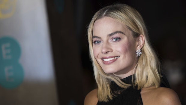 Margot Robbie says David Higgins gets her in her "best physical shape."