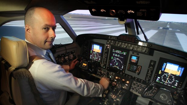 Liberal MP Gordon Rich-Phillips, who has flown through the COVID-19 lockdown, pictured here in a flight simulator in 2012.