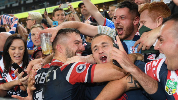 The Roosters celebrate their 2019 grand final win. 