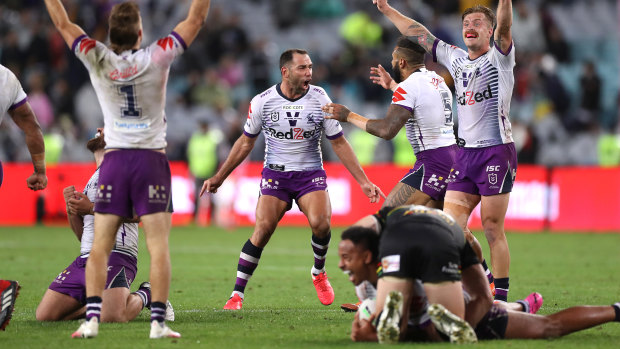 Cameron Smith and the Storm celebrate winning the 2020 grand final.