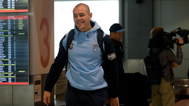 Winners are grinners: David Klemmer arrives at Sydney Airport on Thursday. 