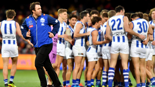 Stronger for longer: Kangaroos coach Brad Scott knows his side are lacking power to compete in the middle of the park.