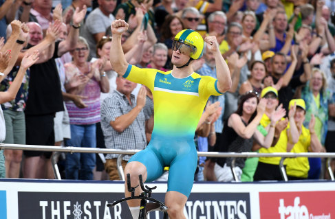 Matthew Glaetzer celebrates after taking Commonwealth Games gold in the 1000m time trial at the Anna Meares Velodrome on Sunday night.