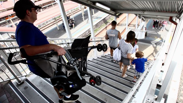 Parents are forced to carry prams down stairs at Redfern station as it has a lift serving just two of its 12 platforms. 