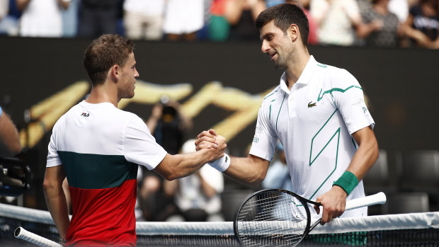 Tall order: Argentina's Diego Schwartzman battled bravely but couldn't overcome Novak Djokovic in their fourth-round encounter.