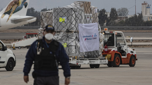 A truck transports a first shipment of the AstraZeneca COVID-19 vaccine in Santiago, Chile.